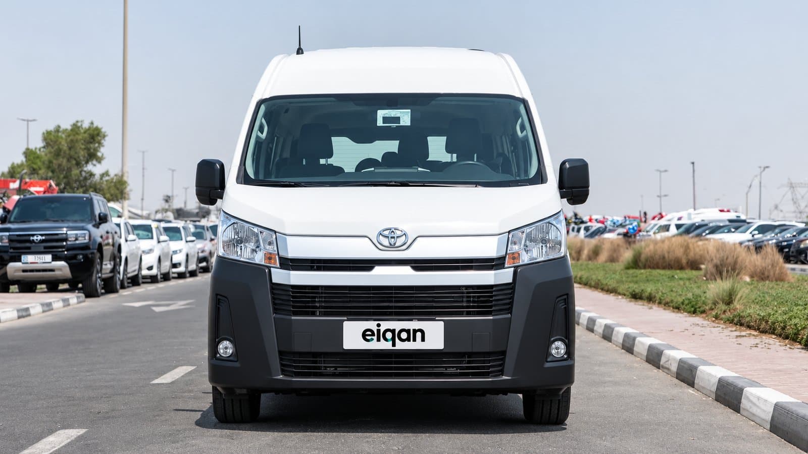 EIQAN-branded rental bus, side view
